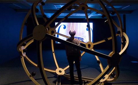 A person walking around an installation