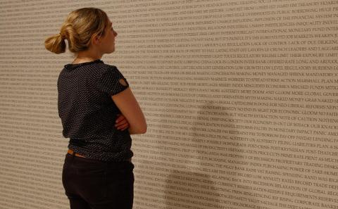 Woman and wall of words