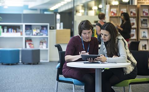 Student getting advice from the visas team