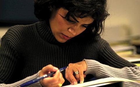 Student writing in an assessment