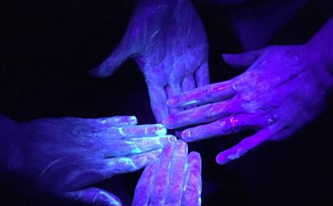 UV germ training lotion used to simulate bacterial transfer