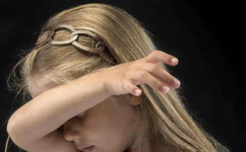 girl hiding her face