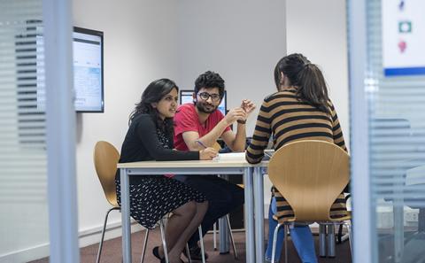 students in a meeting