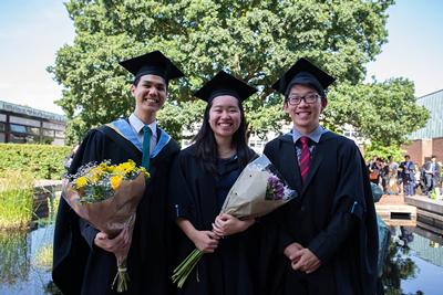 Three students of the class of 2019