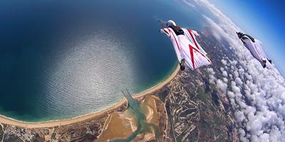 Fig 9 Dr Grubisic is an experienced wingsuit BASE jumper and wingsuit pilot seen here flying above the Algarve