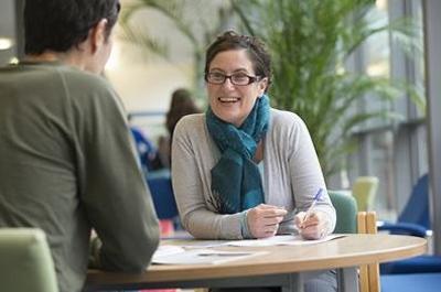 Student talking to a practitioner
