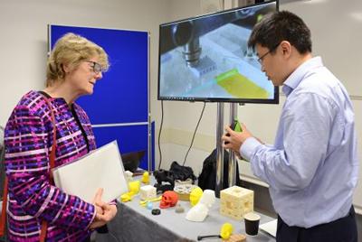 Dame Sally Davies touring the exhibits