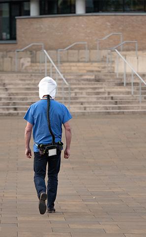 Paul Elkington walking towards Building 85 wearing a PeRSo, image by Ric Gillams