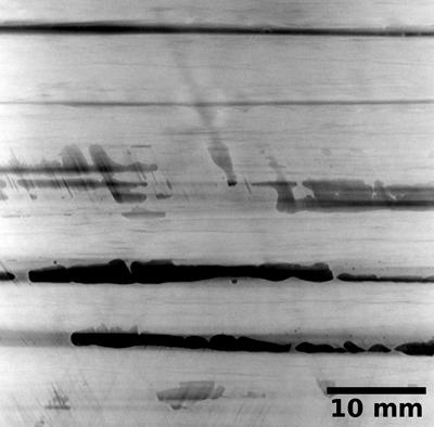 Porosity in a carbon fibre-reinforced composite: sum projection through 0.9 mm thickness