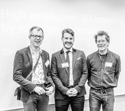 Photograph of Dr. P. Schneider Dr C. Hutchinson and Dr. A. Page at the meeting