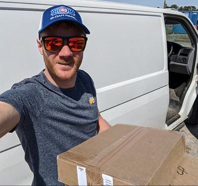 George Bareham delivering PPE