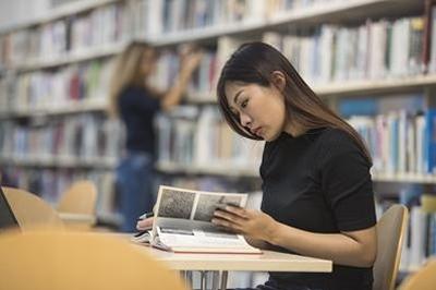 Student reading a book
