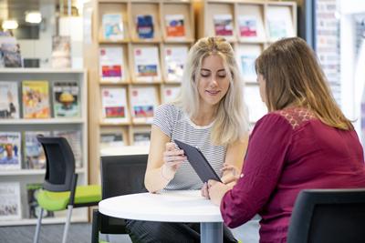An adviser talking to a student
