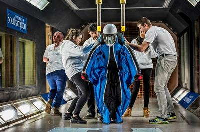 Fig 10 Students performing experimental wind tunnel tests with Dr. Grubisic