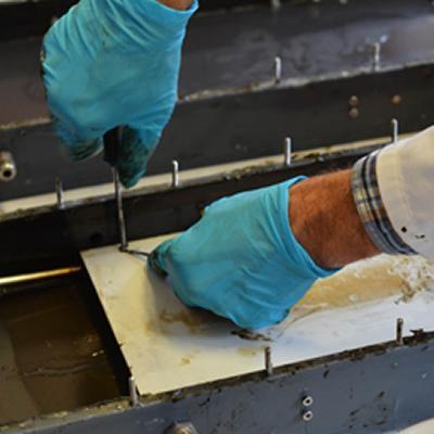 Laboratory bioreactors being disassembled to replace the membranes