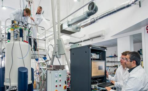 Technicians working on a machine