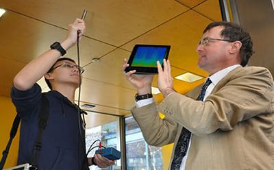 Professor Tim Leighton & colleague