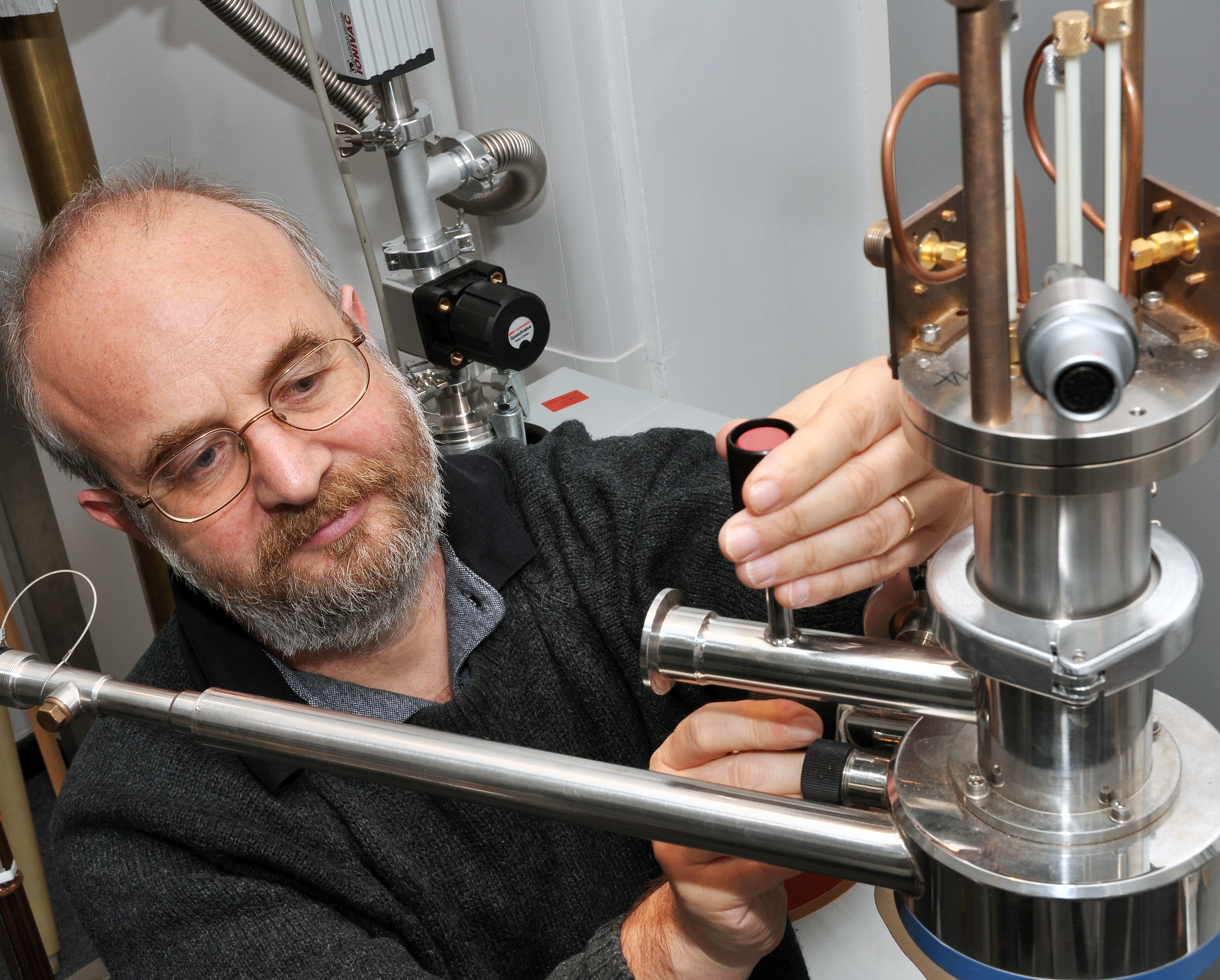 A man working on a machine.