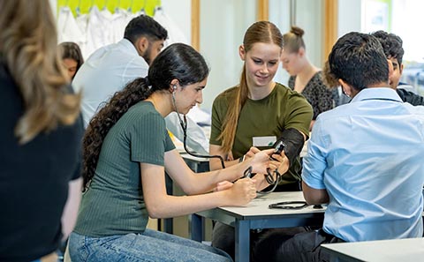 School pupils with medical students