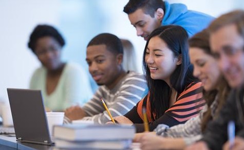 students sat at computer