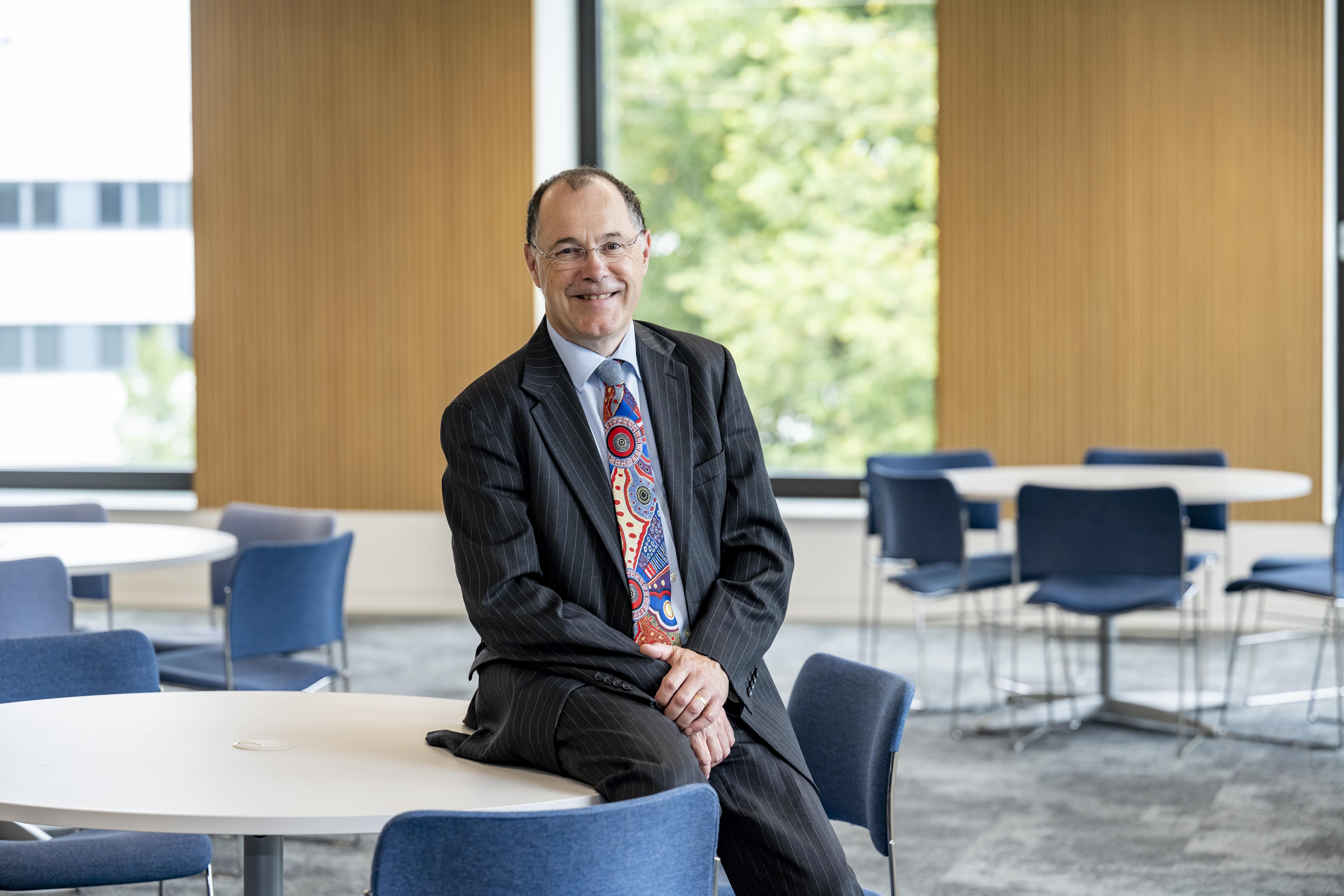 Portrait photograph of Professor Mark E. Smith looking to camera