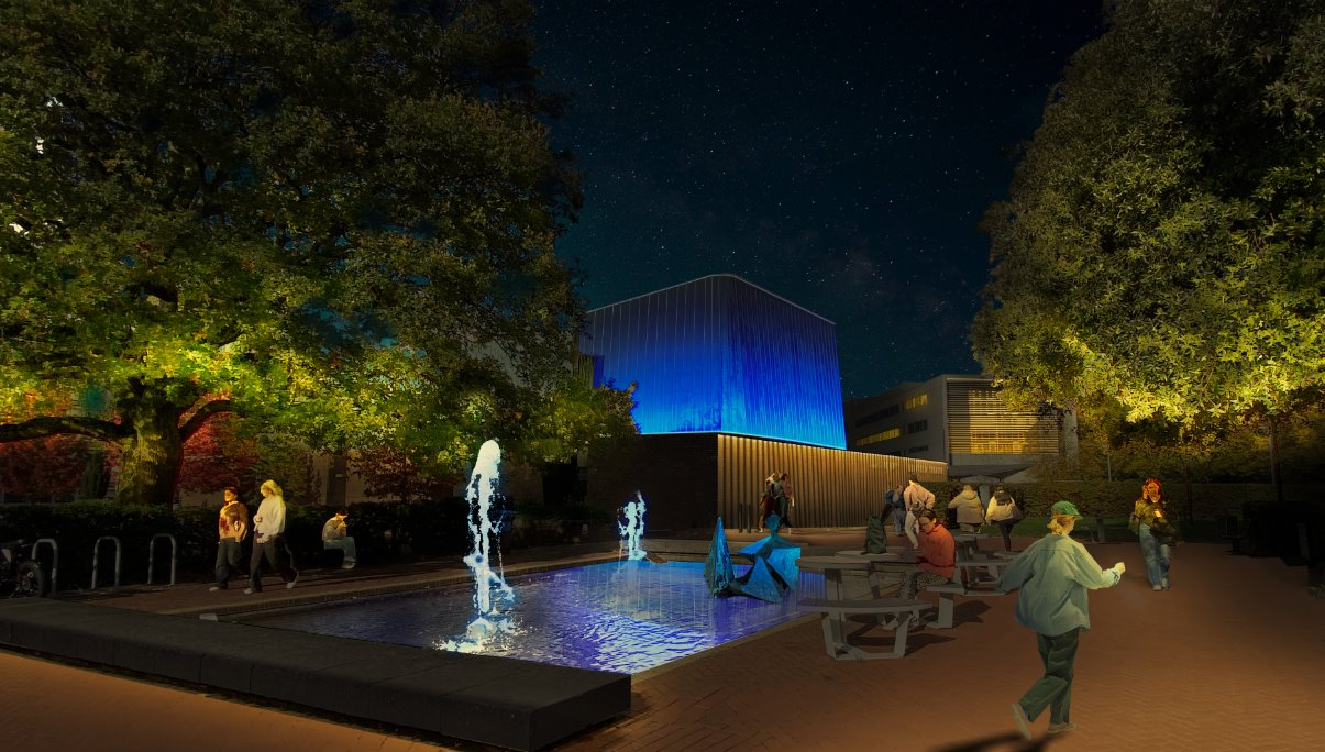 The Nuffield Theatre and pond on Highfield campus at night