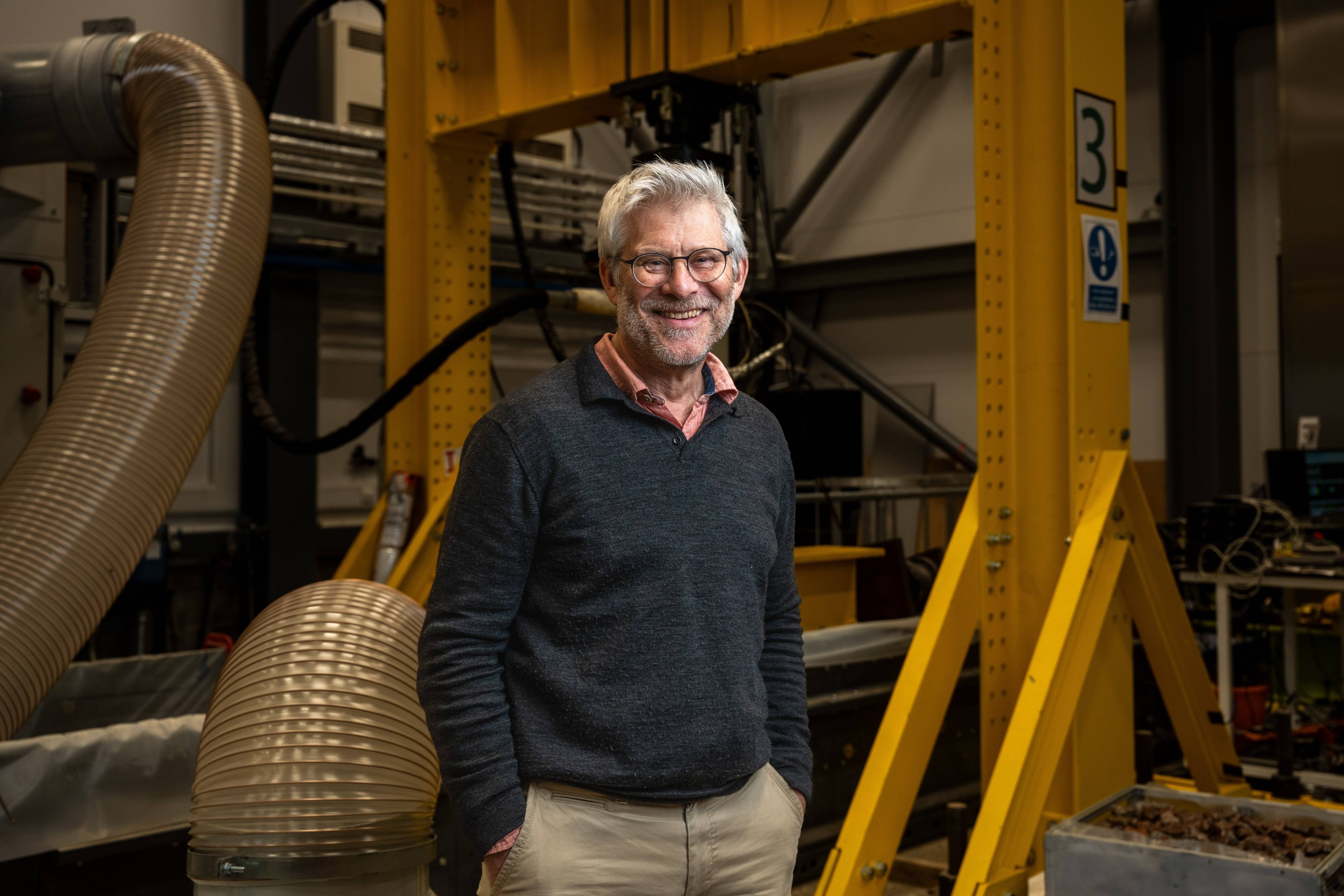 Professor David Richards standing in Southampton's geotechnical engineering laboratory.