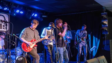 Music students performing in a band