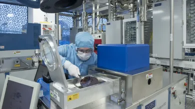 Researcher in a cleanroom