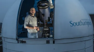 Researcher using a rooftop observatory