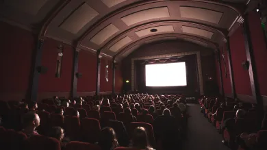 An audience watching a film