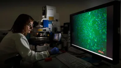 Researcher using some biomedical engineering equipment