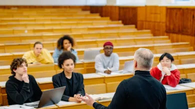 Lecturer and students in a lecture theatre