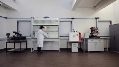 A woman researcher working at the e-textile laboratory