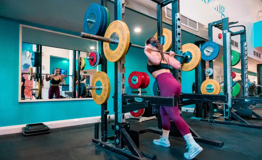 Athlete lifting weights in the gym