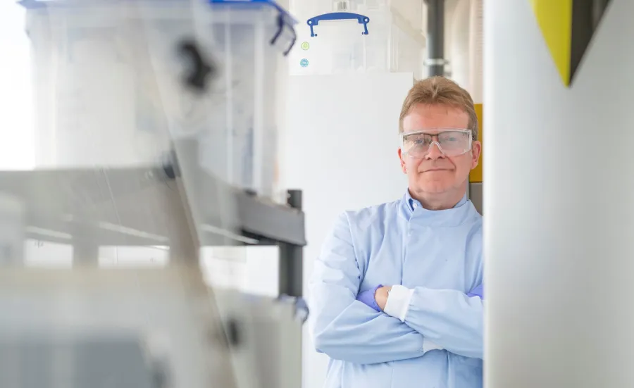 NOC consultant Andrew Cundy standing in a lab.