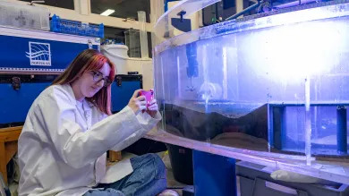 Scientist working with lab equipment