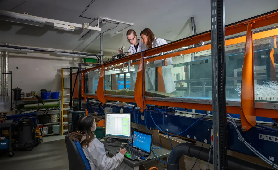 Scientists working with lab equipment