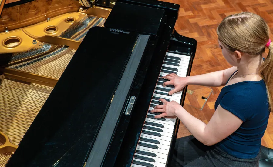 BA Music with Year Abroad student at piano