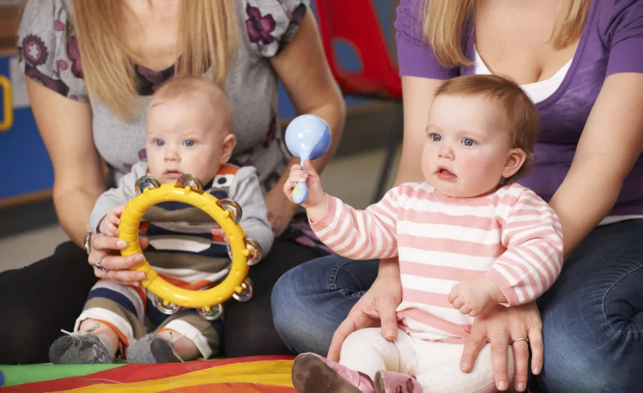 Early Years Centre children playing with toys