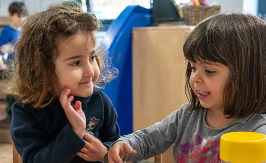 Children at the Early Years Centre playing with a puzzle