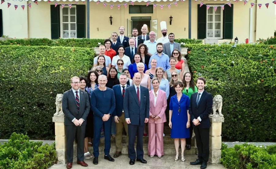 Their Royal Highnesses the Duke and Duchess of Edinburgh, Jacob Brooks and the embassy staff standing on the steps outside the British embassy in Malta.