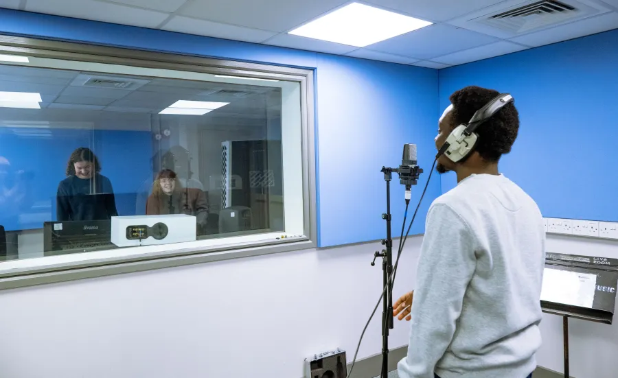 BA Music and Business Management student at microphone