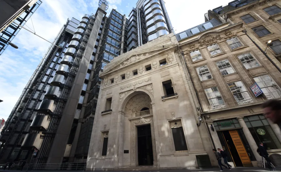 Exterior of the Lloyd's  building showing both the modern and historic buildings