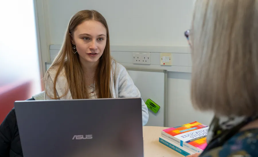 Mia in an education meeting