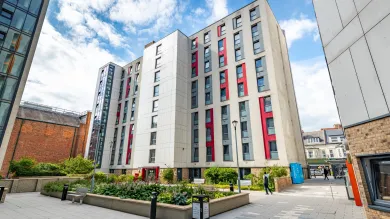 Mayflower C block with the courtyeard garden in the forefront.