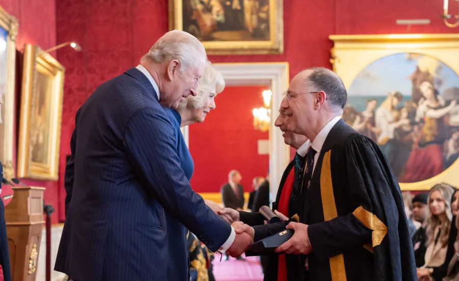 King and Queen present royal prize to Southampton rail researchers at Windsor Castle.