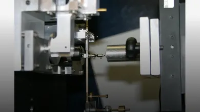Nanoindenter tip as it approaches surface