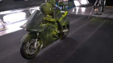 A figure of a motorcyclist inside wind tunnel