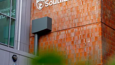 Jubilee Sport and Recreation Centre entrance showing a white University sign and logo.